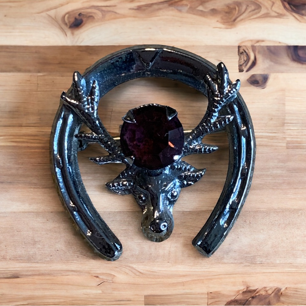 Scottish stag brooch with amethyst glass stone. Signed and vintage. Mitzpah
